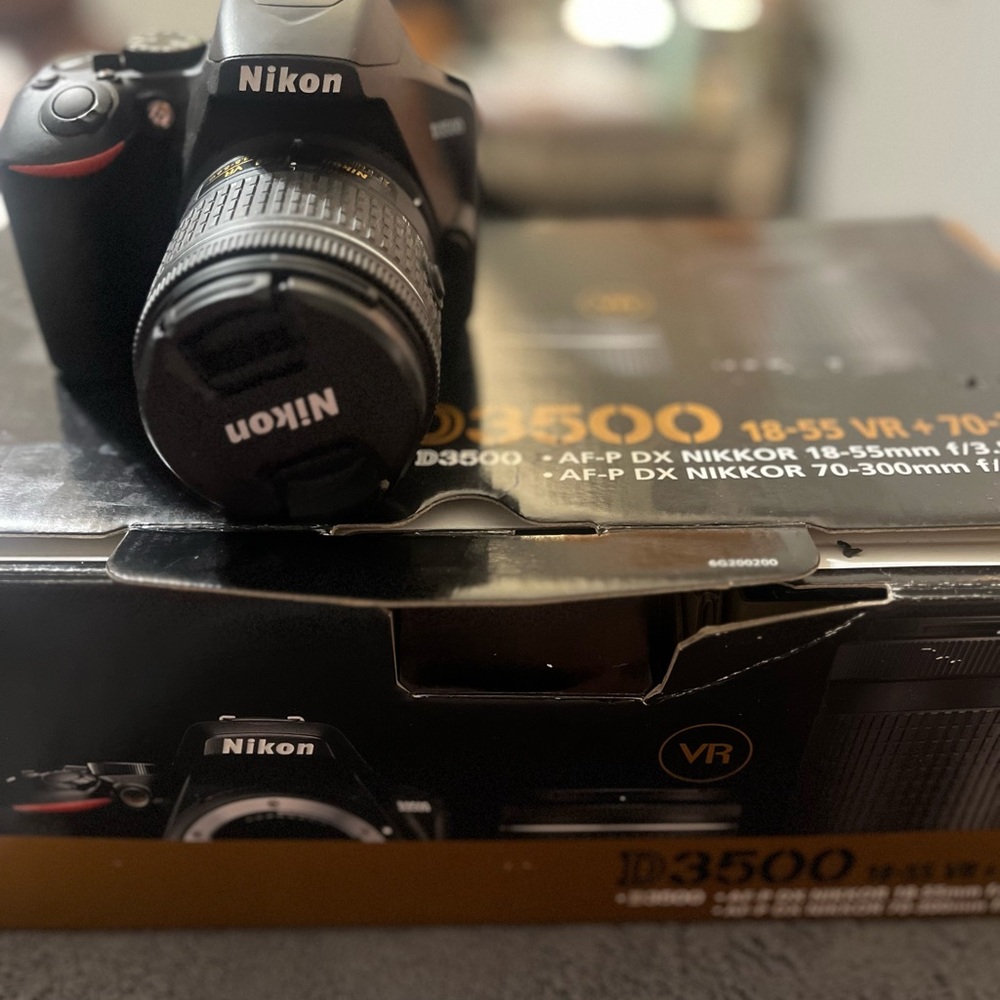 Nikon D3500 DSLR Camera with Black and Gold Accents